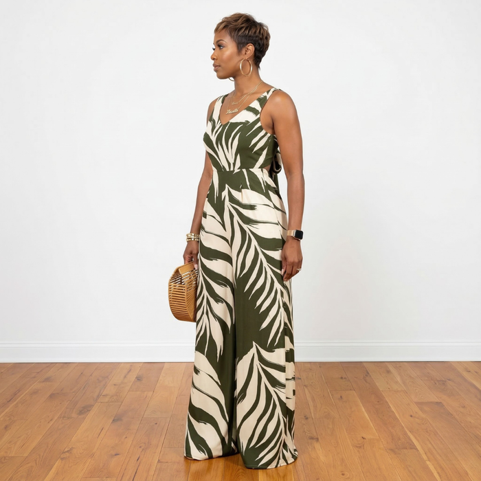 Side view of Dion olive leaf print loose fit V-neck jumpsuit – House of Charlotte Boutique