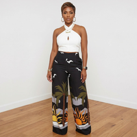 Sasha palm tree print two-piece pants set worn by model – House of Charlotte Boutique