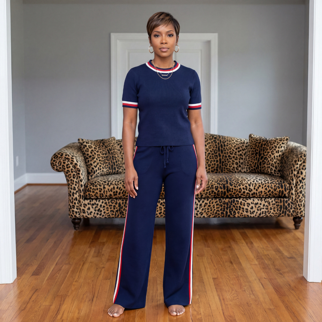 Lane Stripe Knit Set in navy featuring a short-sleeve knit top with border stripe detail and matching pants with side stripes and a drawstring elastic waist, shown front view.