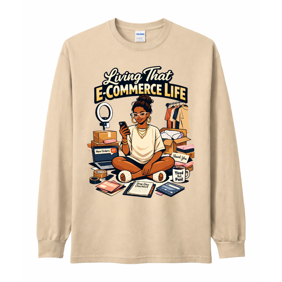 Beige long-sleeve shirt with an illustration of a woman and text 'Living That E-Commerce Life' on a white background.