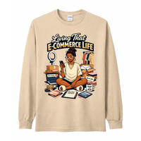 Beige long-sleeve shirt with an illustration of a woman and text 'Living That E-Commerce Life' on a white background.