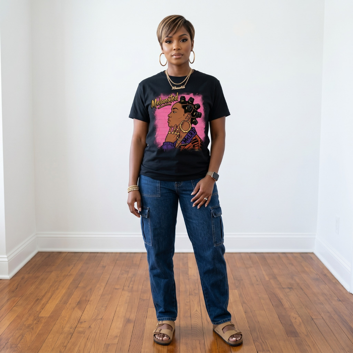 Black Melanated graphic t-shirt with pink background design and gold lettering on soft unisex tee