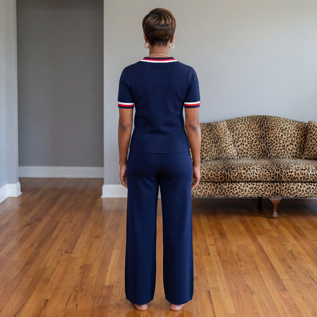 Back view of the Lane Stripe Knit Set in navy highlighting the full two-piece silhouette, knit fabric texture, and straight-leg pants with a 32-inch inseam.