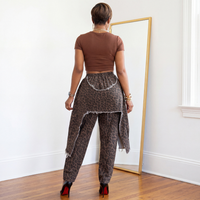 Back view of leopard double layer deconstructed jeans