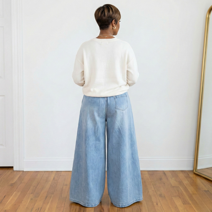 Back view of Celeste wide leg denim gauchos in light denim showing the dramatic wide-leg fit and single back pocket