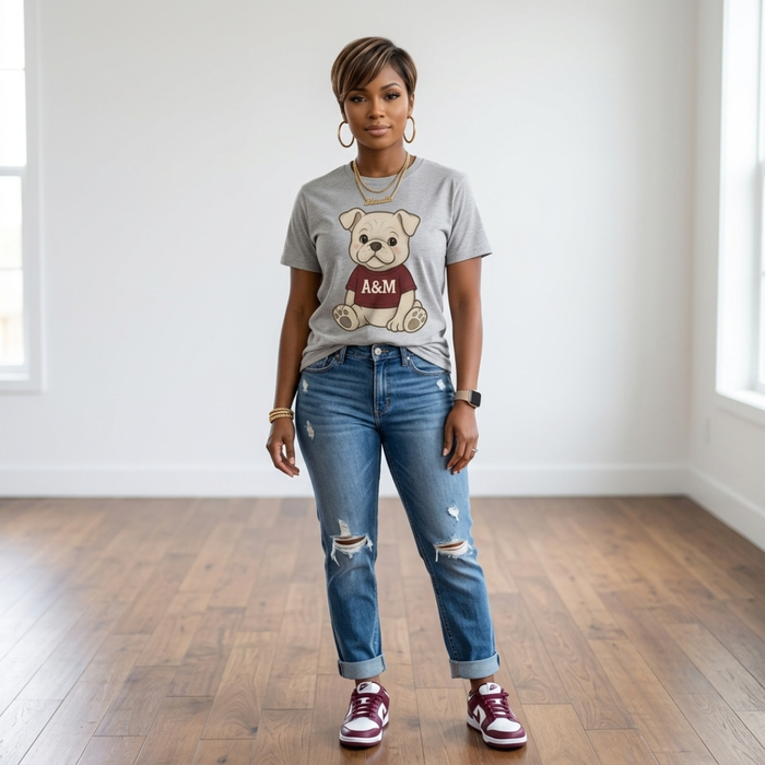 African American woman wearing the Bulldog Game Day Tee in heather gray with cuffed distressed jeans and burgundy and white sneakers