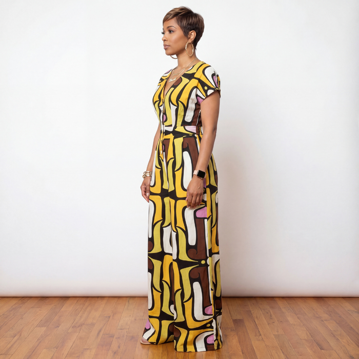 Side view of Melanie brown and mustard multi print button down wide-leg jumpsuit – House of Charlotte Boutique