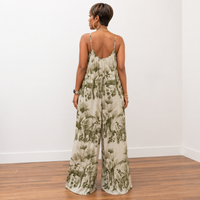 Back view of Sarai safari printed wide leg jumpsuit in olive showing relaxed fit and wide leg silhouette